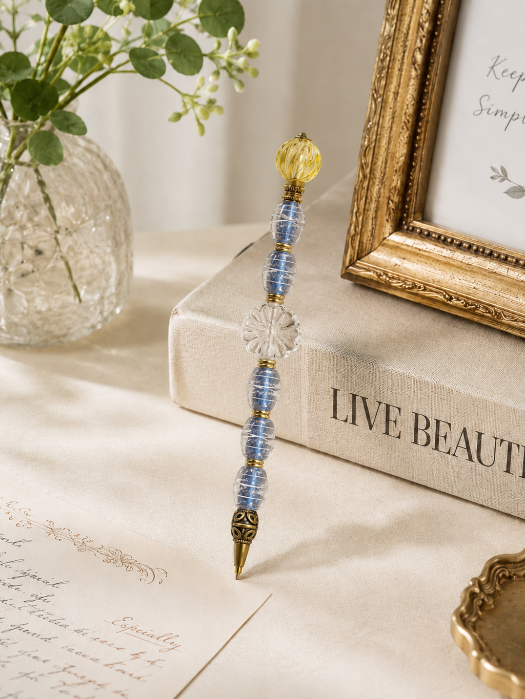 Elegant desk vignette with the Delft Spiral beaded pen