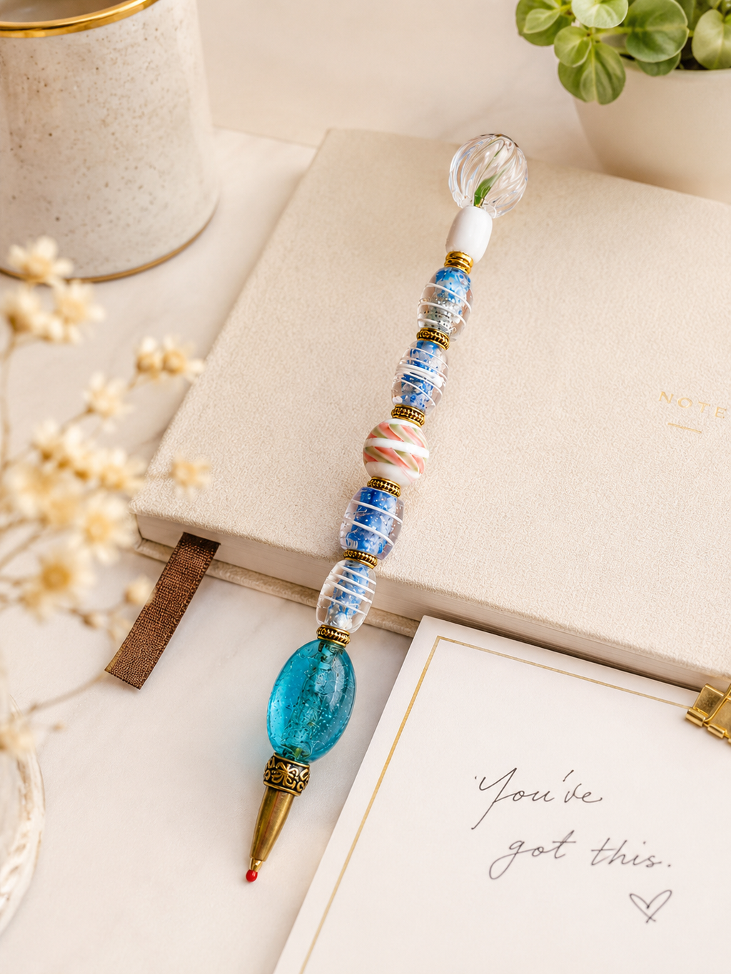 Elegant desk vignette with the Seaglass Ribbon beaded pen