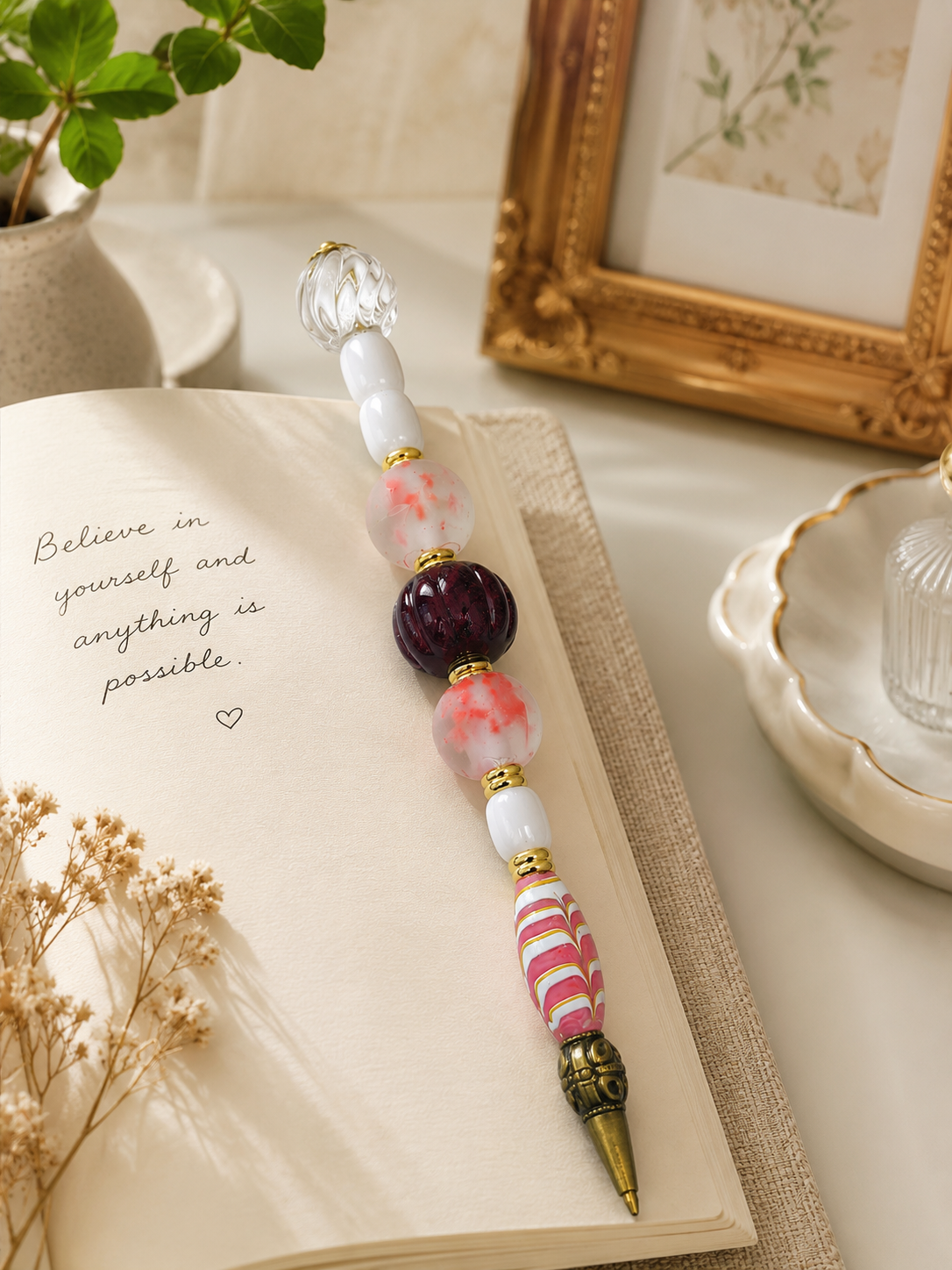 Elegant desk vignette with the Garnet & Blush beaded pen