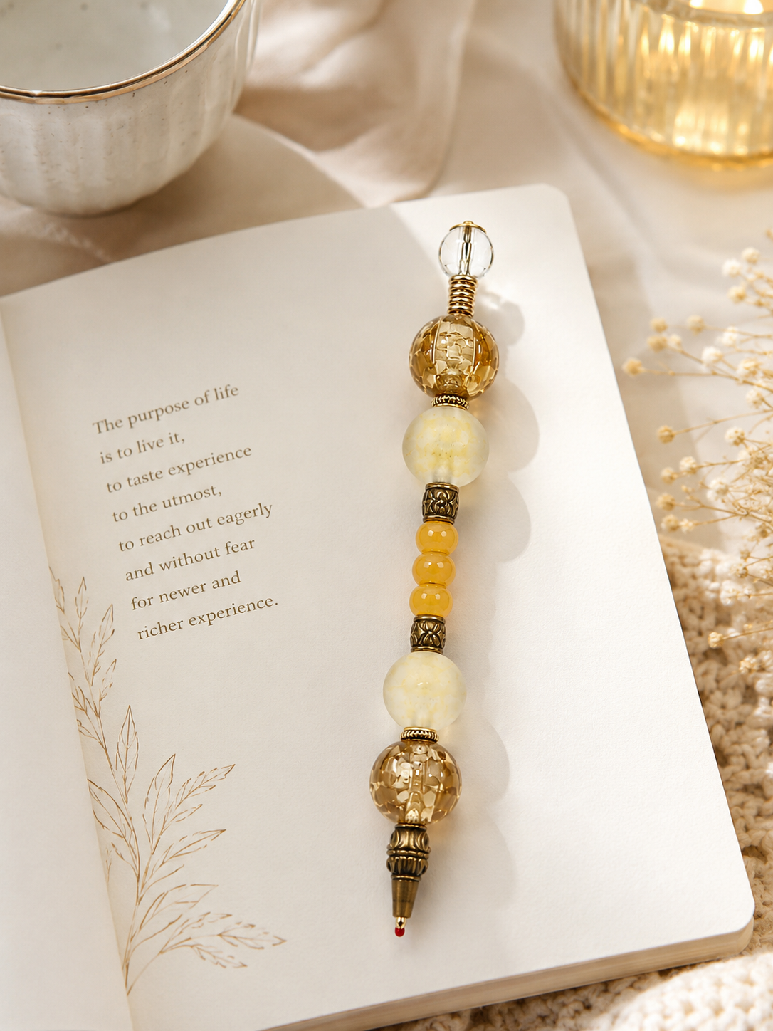 Elegant desk vignette with the Golden Amber beaded pen